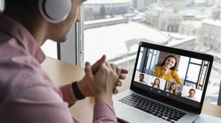 man-having-an-online-video-call-with-coworkers